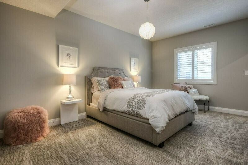 Elegant bedroom with soft grey walls