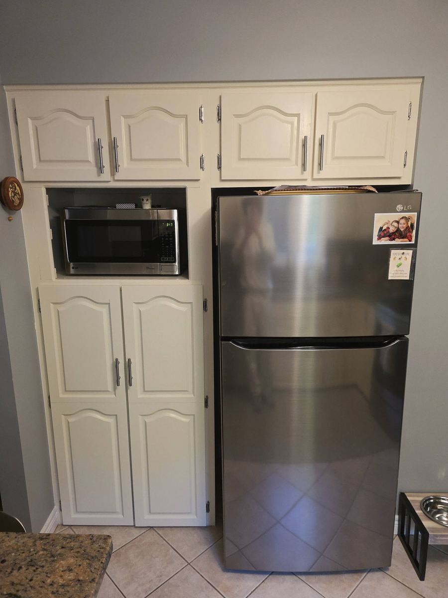 After: Cabinets painted fresh white